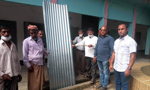 ধর্মপাশায় ত্রান ও দুর্যোগ অধিদপ্তর এর উদ্যোগে ঢেউ টিন ও চেক বিতরন