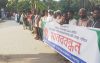 বাবুগঞ্জে ভোট কেন্দ্রে তাবু টানিয়ে ভোট নেয়া কেন্দ্রটি পরিবর্তনের দাবিতে মানববন্ধন